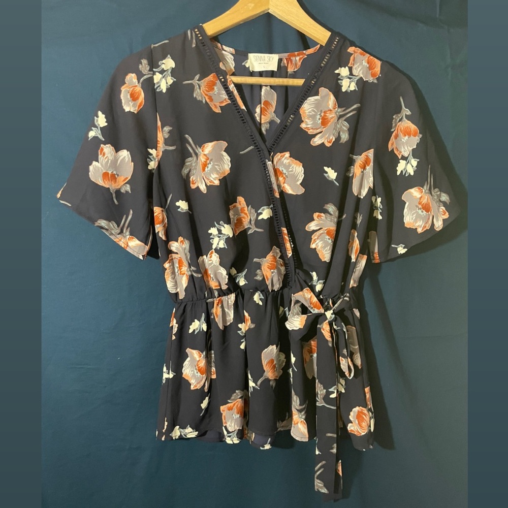 Ruffle sleeve floral top with tie waist